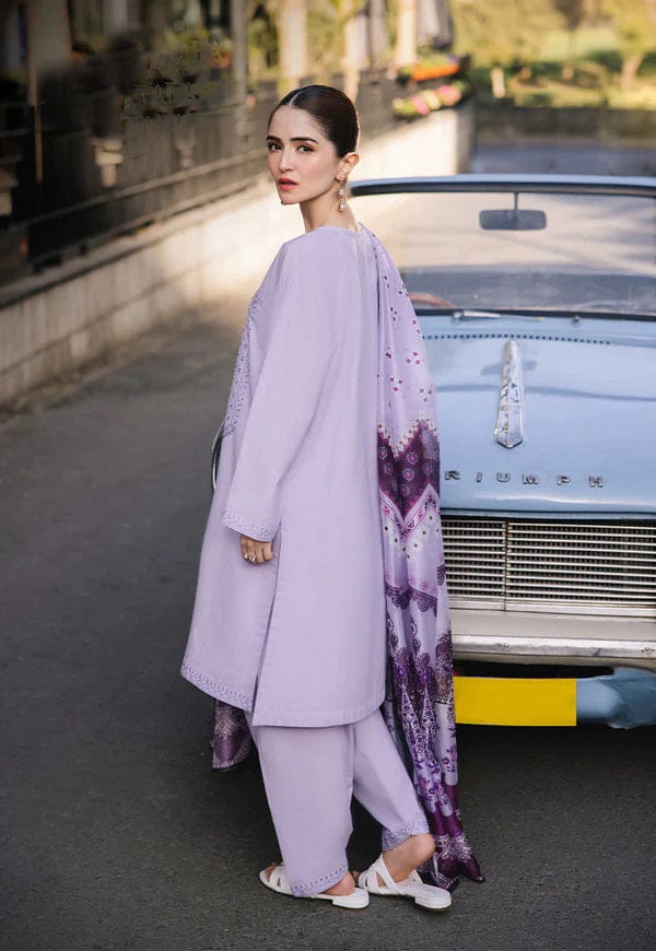 Embroidered lawn suit by Shaa Posh with digital printed poly lawn dupatta, featuring intricate embroidery and vibrant fabric details.