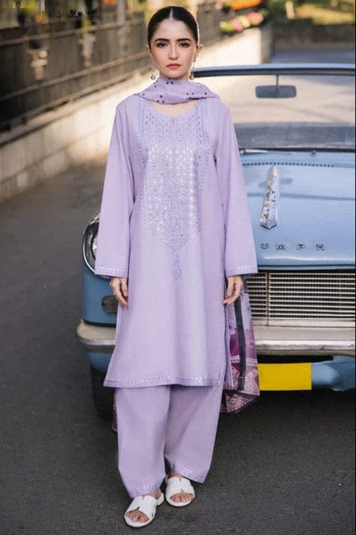 Embroidered lawn unstitched 3-piece suit with digital printed poly lawn dupatta by Shaa Posh, displayed on a hanger.