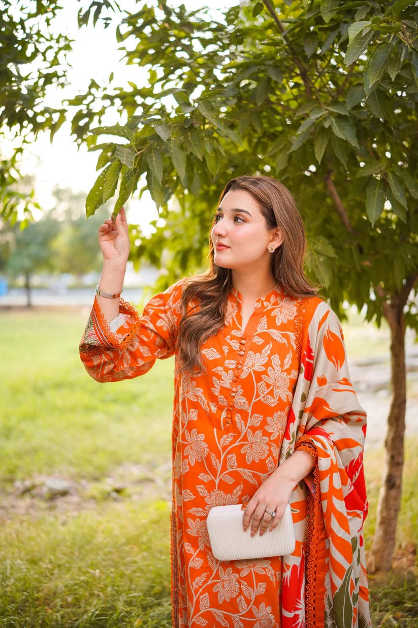 Unstitched printed lawn 3-piece suit with chiffon dupatta by Shaa Posh, featuring colorful floral patterns and elegant fabric details.