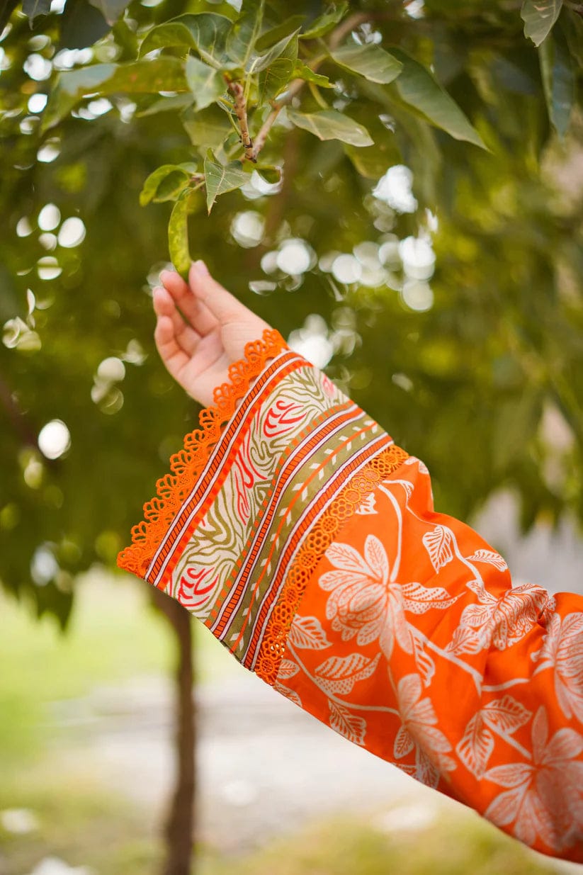 Unstitched printed lawn three-piece suit with chiffon dupatta from Shaa Posh, featuring colorful floral patterns and intricate design.