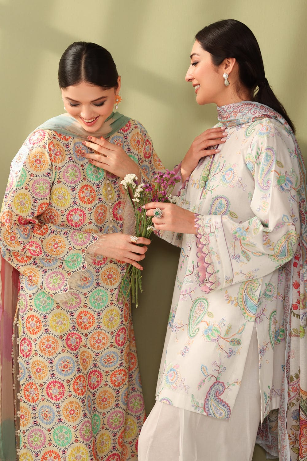 Unstitched digital lawn 3-piece suit by Shaa Posh with digital crinkle dupatta, featuring vibrant printed fabric and intricate details.