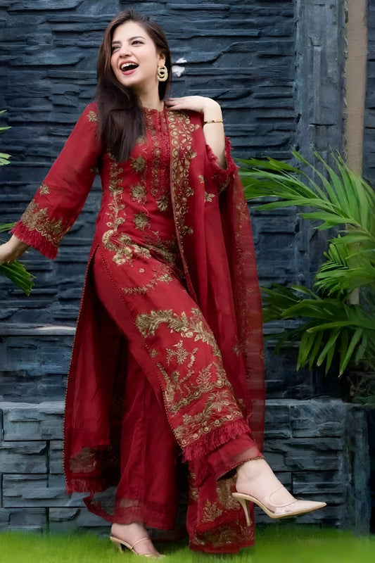 Unstitched three-piece lawn embroidered suit set with organza embroidered dupatta by Shaa Posh, featuring intricate embroidery and vibrant fabric.
