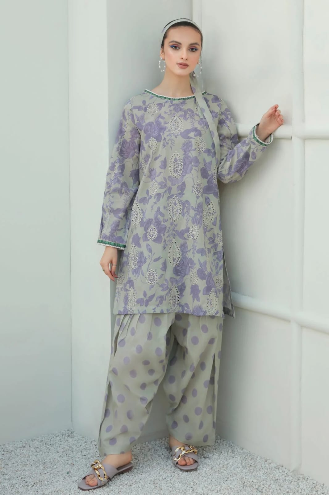 Unstitched digital printed lawn suit by Shaa Posh with matching printed lawn trousers, displayed on a plain background.