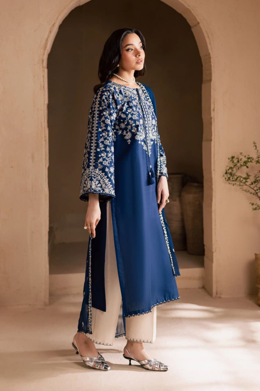 Fully embroidered unstitched lawn suit with embroidered bamber chiffon dupatta by Shaa Posh, featuring intricate embroidery on fabric.