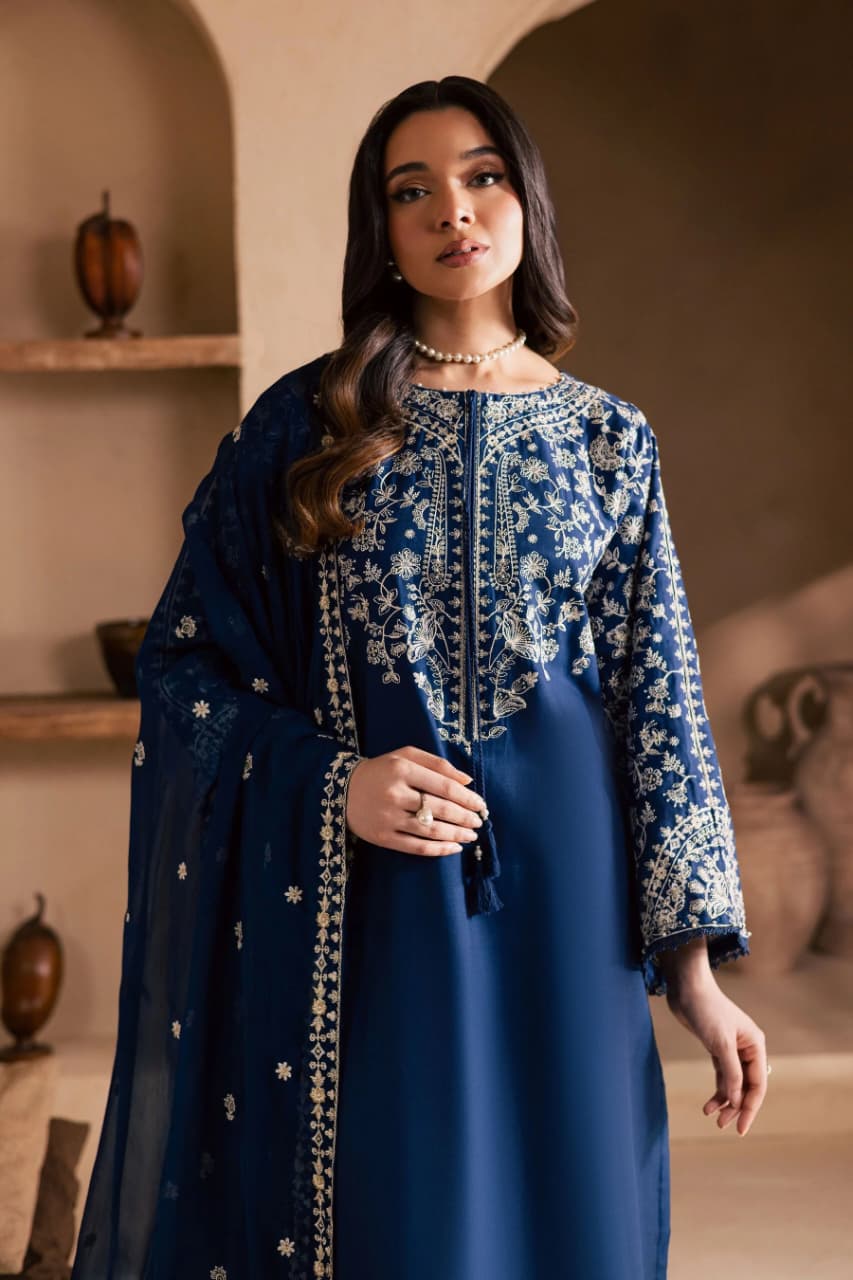 Unstitched fully embroidered lawn suit by Shaa Posh with matching embroidered chiffon dupatta and intricate floral embroidery details.