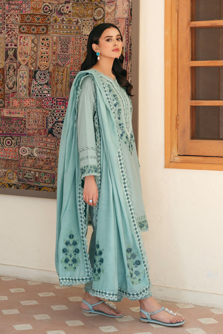 Three-piece unstitched embroidered lawn suit by Shaa Posh, includes heavy embroidered fabric and four-sided embroidered lawn dupatta.