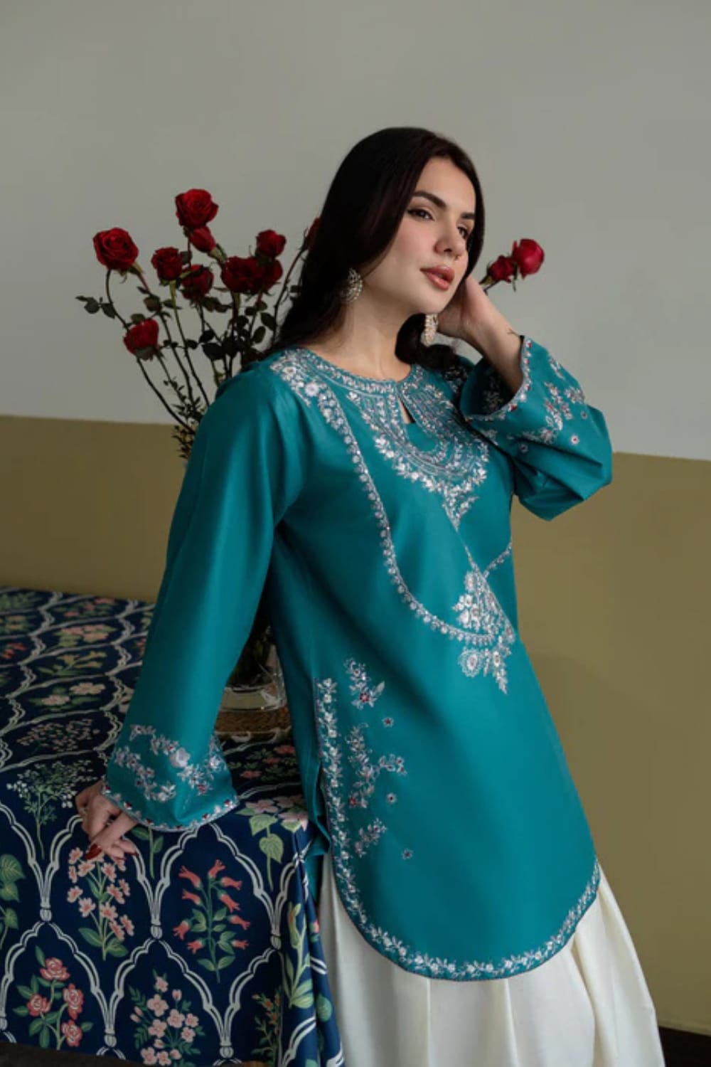 Two-piece embroidered lawn trouser set by Shaa Posh, featuring fully embroidered fabric and stylish design.