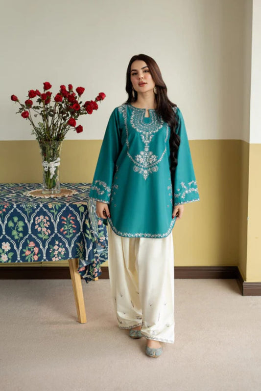 Fully embroidered Shaa Posh SP-6.1 lawn two-piece trouser set displayed on a hanger with intricate embroidery details visible.